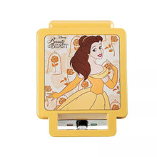 Yellow Disney Beauty and the Beast waffle maker with Belle illustration on lid