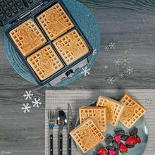 Waffle maker plates with six Frozen waffles, and plated waffles with berries