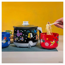 Mickey Mouse hot pot with lid and red ramen bowl next to blue bowl
