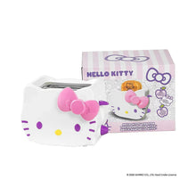 Hello Kitty toaster in white with pink bow, shown with retail box