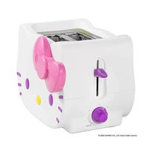 White toaster with pink bow lever and purple dial on the front