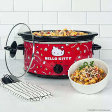 Hello Kitty 5-qt slow cooker with red body and black lid, plus bowl of food beside