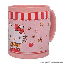 Pink Hello Kitty mug with red striped band and hearts, round handle