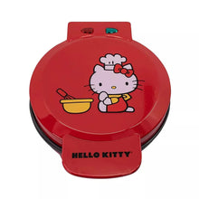Red Hello Kitty waffle maker with circular lid and handle graphic