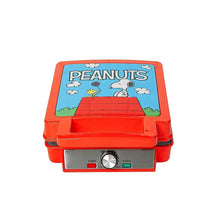 Red deluxe waffle maker with Peanuts graphic lid and power control panel