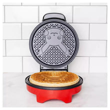 Pikachu waffle maker with black circular lid and red base, ready-to-bake plates