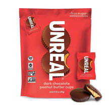Unreal dark chocolate peanut butter cups pouch with wrapped pieces and chocolate cup