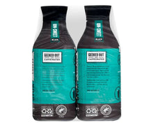 Two unsweetened cold brew coffee pouches, teal and black, sealed.