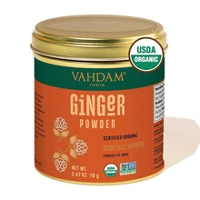VAHDAM ginger powder jar with gold lid and red label