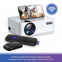 White mini projector with front lens, Roku remote and streaming player on display
