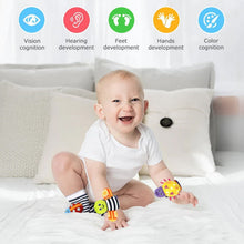 Striped foot rattle socks with colorful character toy attached