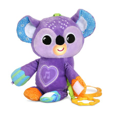 Purple koala plush toy with heart emblem, green hook, and orange ring accessories
