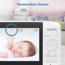 Handheld baby monitor showing baby video with temperature sensor indicator