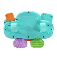 Baby driver toy back view in light teal with molded grips and fabric feet