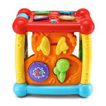 Colorful plastic activity cube toy with front panel buttons and hinged animal pieces