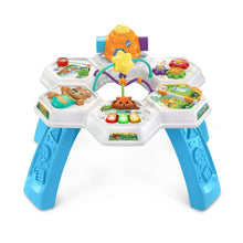 Baby activity table with orange owl speaker, star bead frame, and animal activity panels