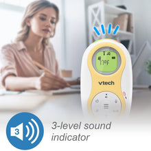 VTech handheld digital audio monitor with green display and round white control dial
