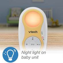 VTech baby unit with orange night light glow and round control area on white and yellow body