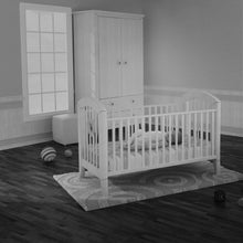 Baby crib with video monitor camera near the floor