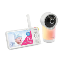 VTech baby monitor camera with white base and matching parent display