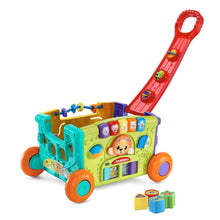 Baby activity wagon toy with colorful panels, wheels, and sorting cubes, red handle