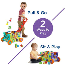Pull-and-go activity wagon toy with orange wheels, red handle, and colorful cube pieces