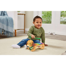 Dog xylophone on carpet with a child pushing a green wand