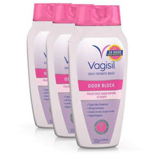 Three intimate wash bottles with pink caps and purple odor block front labels