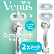 5-blade Venus manual razor with silver handle and two blade refill cartridges