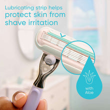 Razor head with lubricating strip and aloe gel marker, aqua detail, close-up