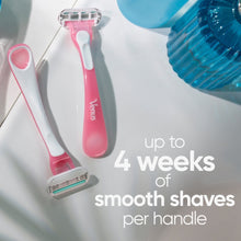 Gillette Venus Smooth Sensitive pink disposable razors with three blades, shown side by side