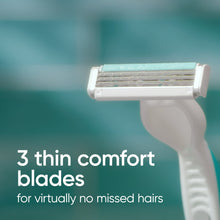 Disposable 3-blade razor head on a white handle, close-up