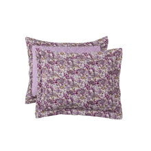 Two matching pillow shams with lilac floral pattern and quilted center detail