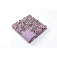 3-piece quilt set folded: lilac quilt with quilted channel and floral top, matching shams