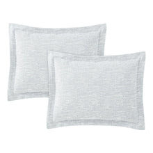 Light gray square shams with textured woven pattern