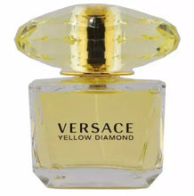 Yellow glass eau de toilette bottle with gold cap and Versace Yellow Diamond label