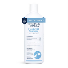 Veterinary Formula flea & tick shampoo bottle, white with blue label