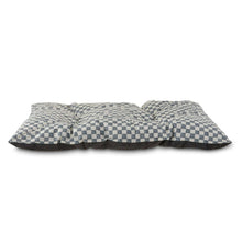 Tufted dog bed pillow with black-and-white checkered bolsters