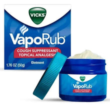 Vicks VapoRub topical chest rub ointment jar, lid, and blue spatula
