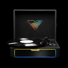 Black illuminated suitcase record player with glowing speaker bar and open lid