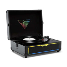 Illuminated suitcase record player with open lid, glowing rainbow light under window