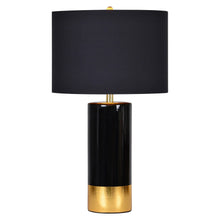 Vienna table lamp front view with black drum shade and gold-accented black base