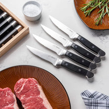 8-piece steak knife set: black handles, serrated blades, in a wooden holder