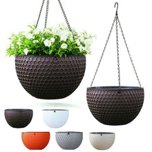 Self-watering hanging planter set with chain hangers and textured hex pattern, dark pot