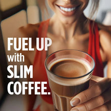 Brewed slim coffee in a glass mug, hands holding the cup with crema on top