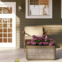 Planter box with gray wood-grain sides and black posts, open top