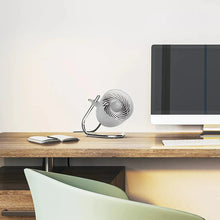 Light gray personal air circulator fan with visible fan blades and base