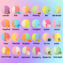 Assorted colorful kids bath bombs with small animal toy toppers in scent varieties