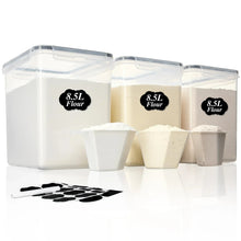 Three 8.5L food storage canisters with chalkboard labels and measuring scoops