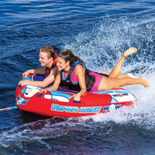 Two-person towable water tube with red, white, and blue graphics; two riders aboard.